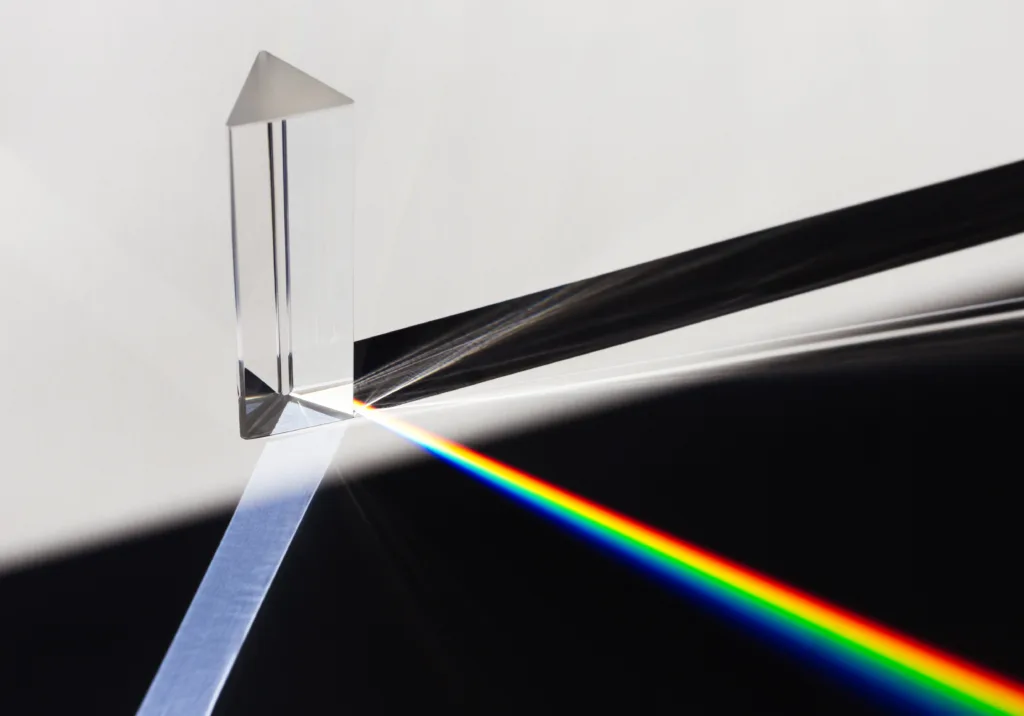 prism dispersing sunlight splitting into spectrum white background